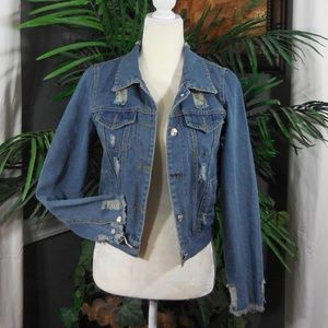 New distressed jean jacket. Women's size M